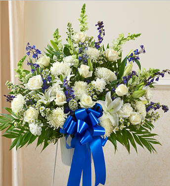 blue white funeral standing spray casket