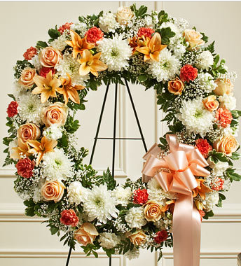 funeral wreath in peach flowers