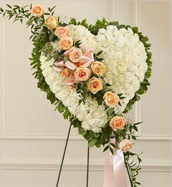 funeral sympathy flowers in peach