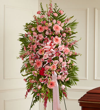 Sympathy standing spray in pink roses