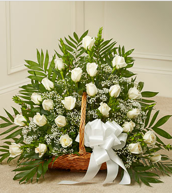 funeral flowers in white basket