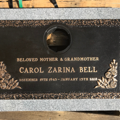 Bronze Plaque on Light Grey Granite