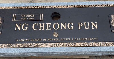 Bronze Plaque on Light Grey Granite