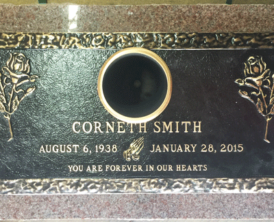 Bronze Plaque on Pink Granite