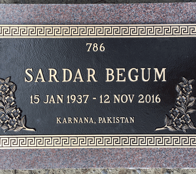 Bronze Plaque on Pink Granite