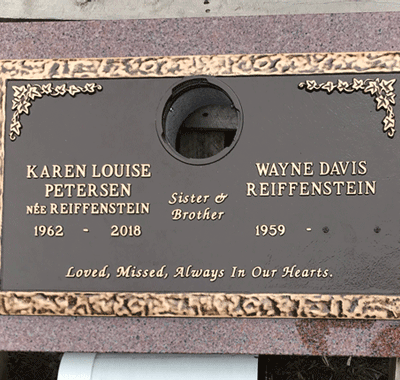 Bronze Plaque on Pink Granite