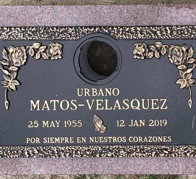 Bronze Plaque on Pink Granite