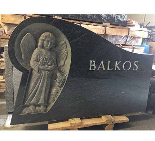 carved angel headstone