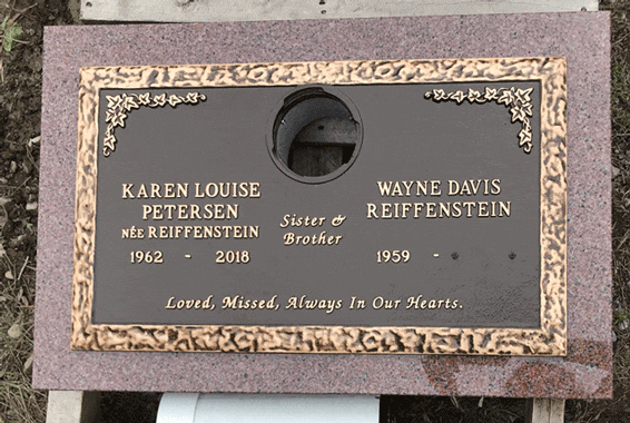 Bronze companion marker with center vase and rose corners
