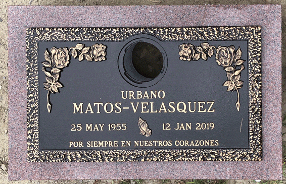 Bronze companion marker on pink granite with center vase