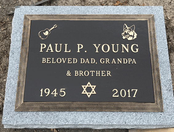 Bronze marker with guitar butterfly and Star of David emblems