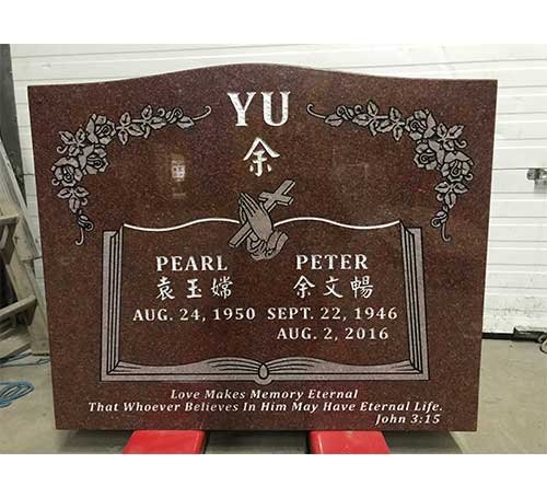 Indian red granite companion headstone with Chinese text and floral corners