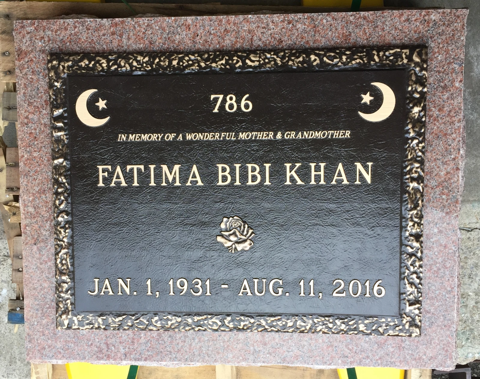 Bronze Marker on Pink Granite for Khan