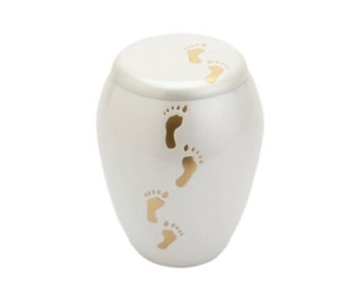 White infant urn with engraved baby footprints
