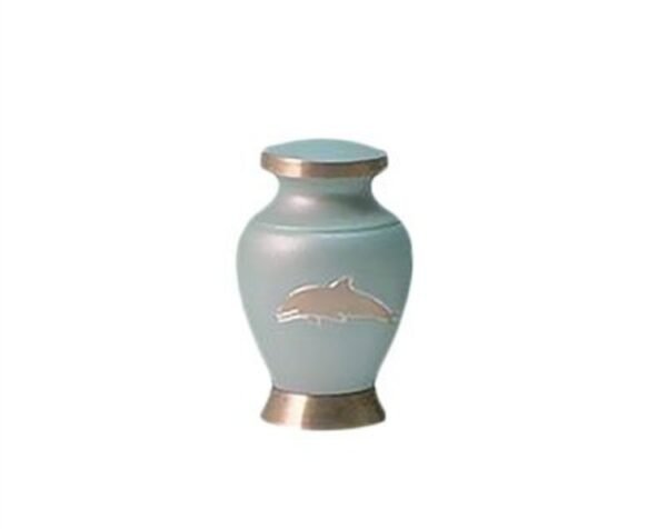Pale blue metal keepsake urn with a silver dolphin and gold-tone base