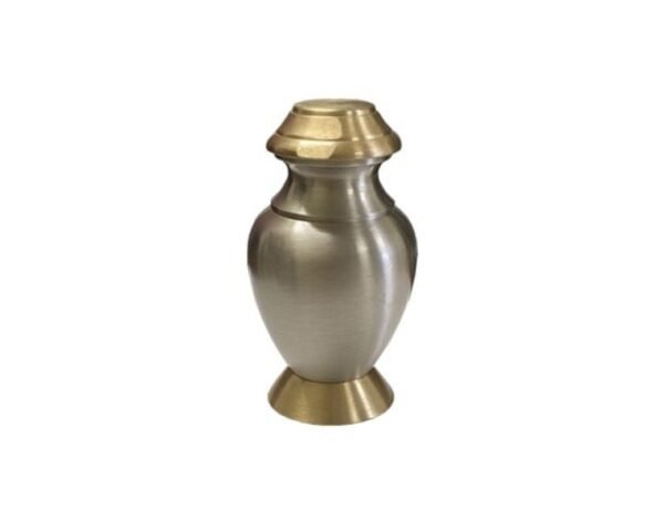 Silver pewter metal keepsake urn with a gold-tone lid and base