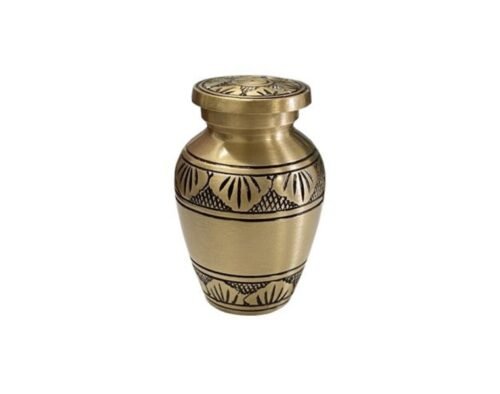 Brass keepsake urn with engraved floral bands