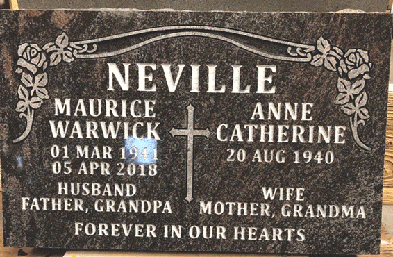Black companion flat marker with floral border and cross