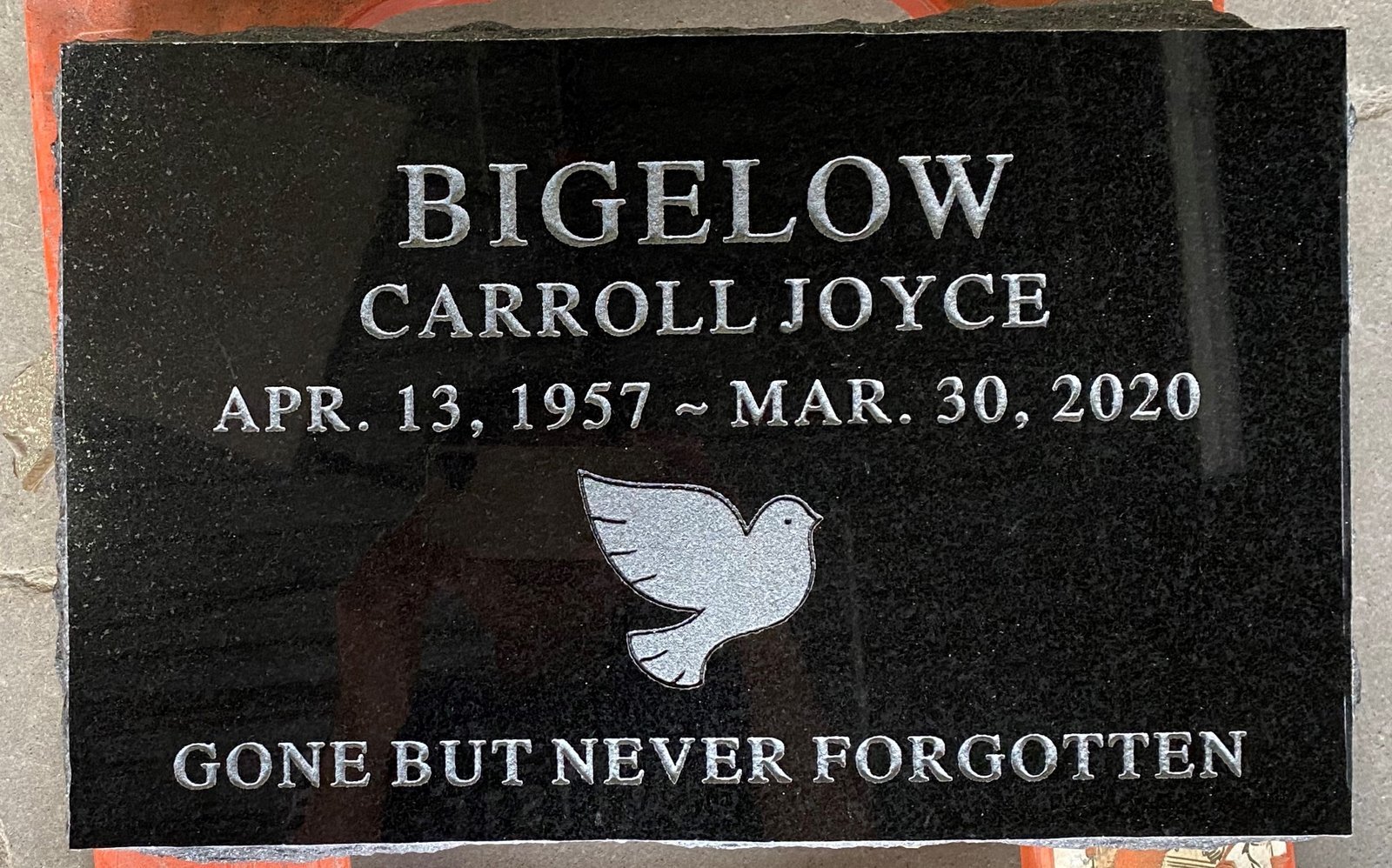 Black flat marker with dove emblem
