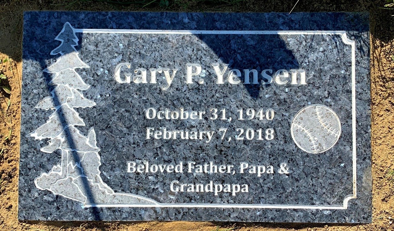 Blue pearl flat marker with hockey player silhouette and puck