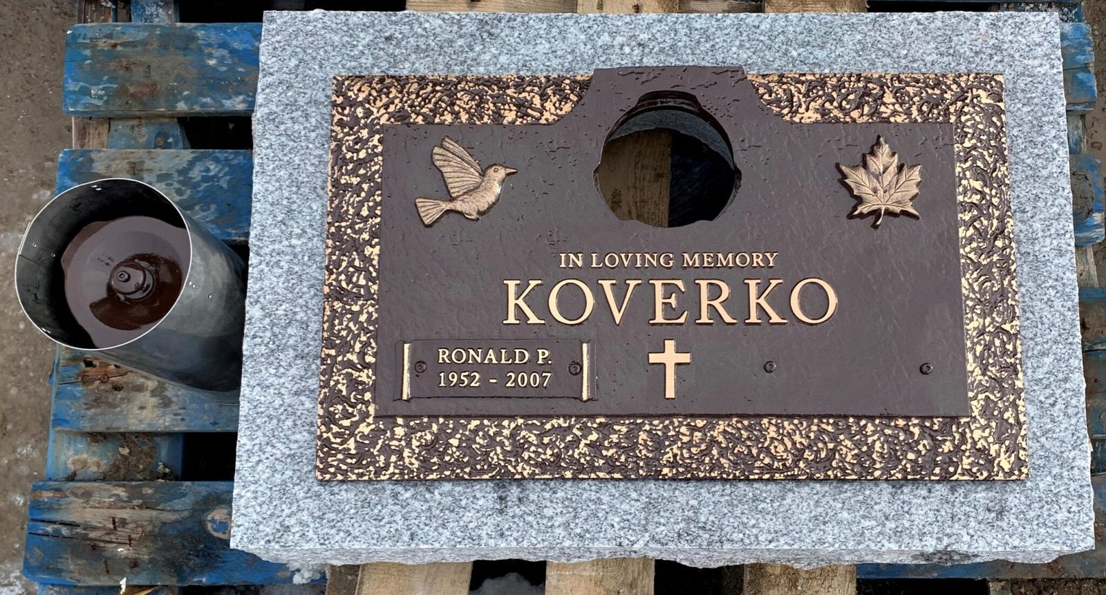 Bronze marker with doves cross and rose border