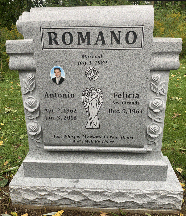 Light Grey granite scroll top companion headstone with carved roses, an angel and a portrait