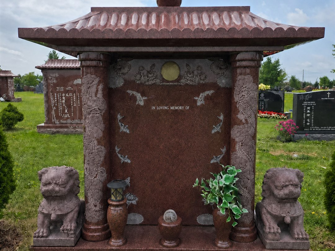 Red granite Chinese style monument with a tiled roof raised clear of the tablet on round columns, a lion figure at each side