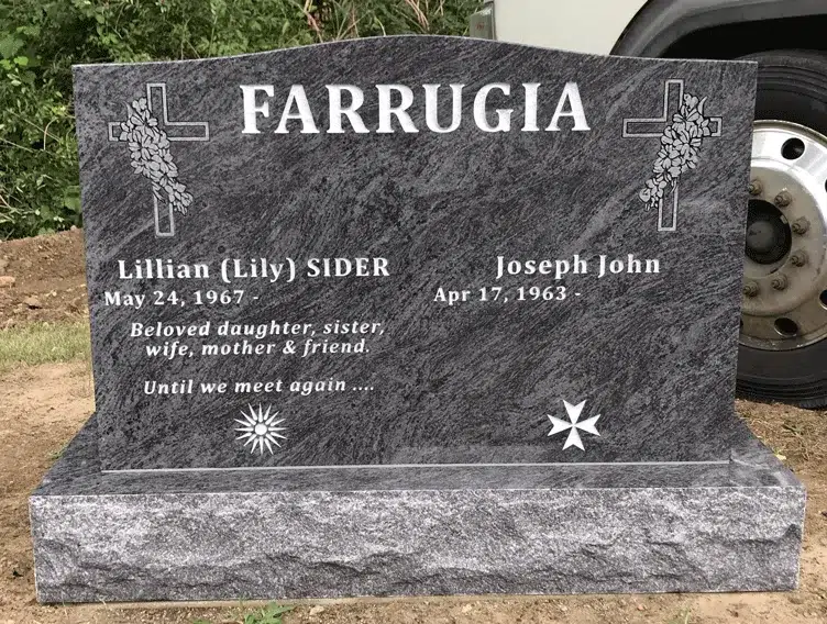 Bahama Blue granite companion headstone with twin crosses and carved roses
