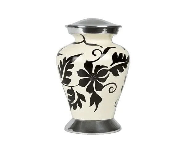 Carnation Metal Urn MU307, cream metal urn with a black flower and leaf design, a polished silver domed lid and flared foot