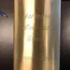 Diamond Engraving on Brushed Brass Urn Diamond engraved script name and years on a brushed brass metal urn, close up of the engraving detail