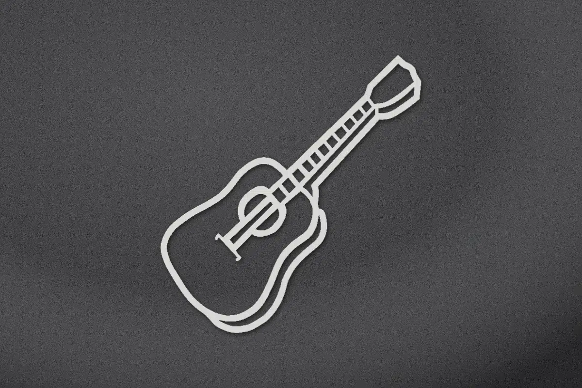 Acoustic guitar engraved on black granite