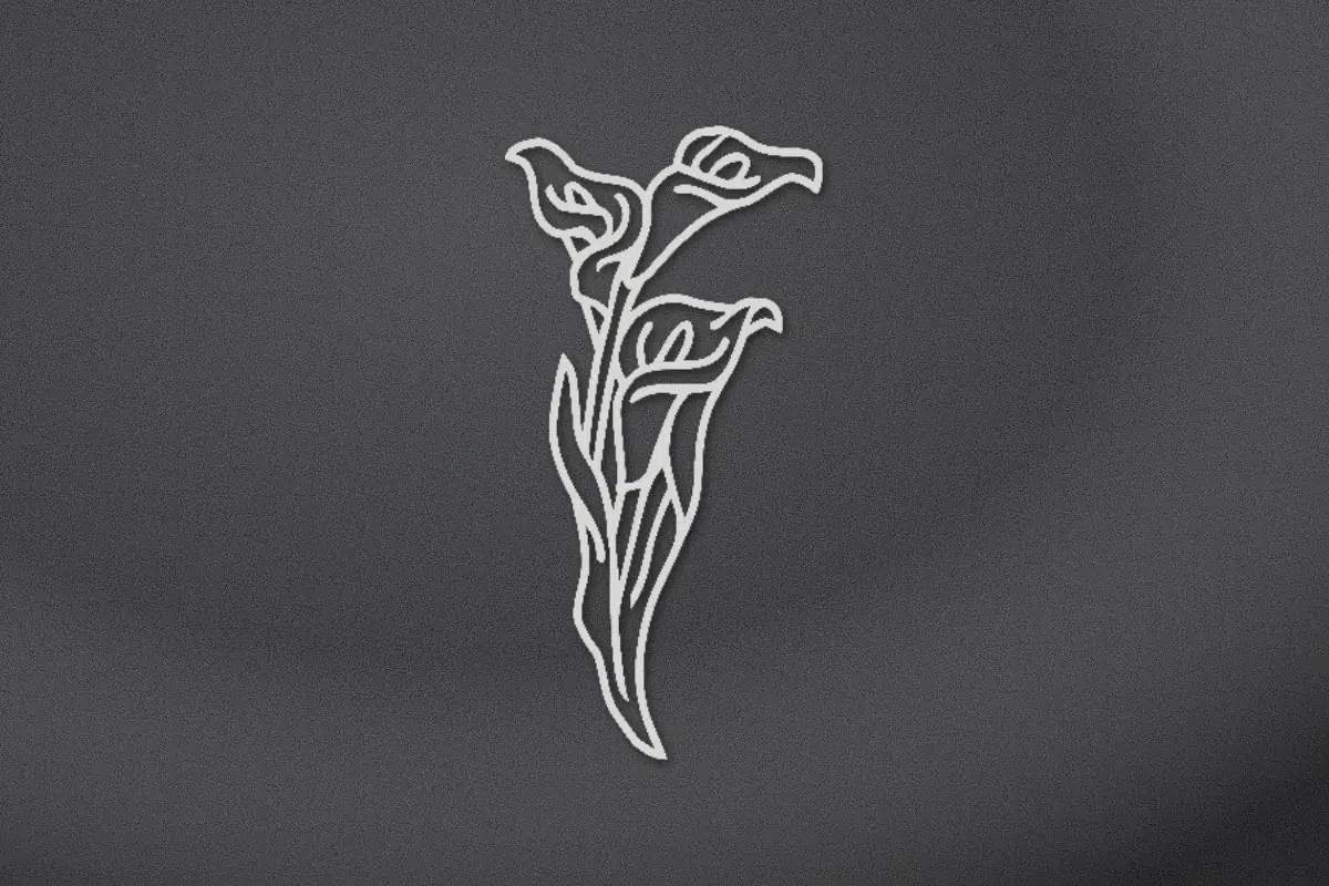Three calla lilies engraved on black granite