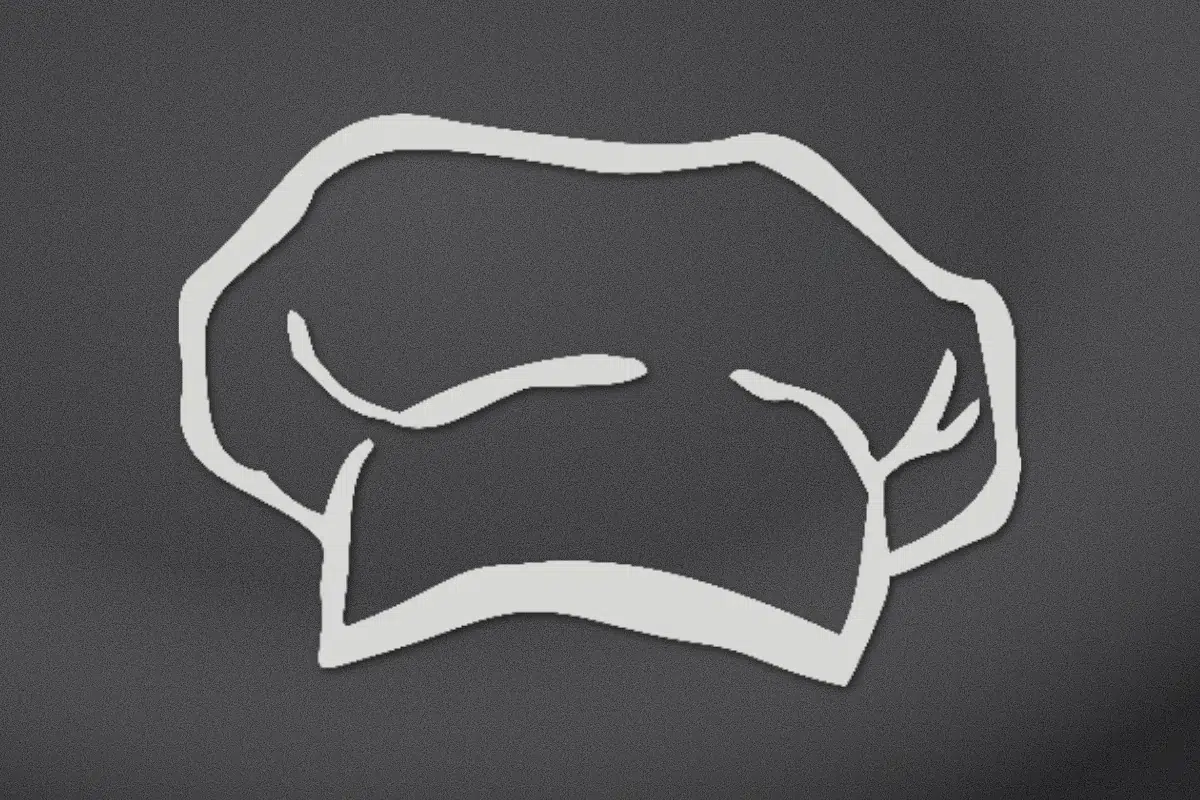 Chef's hat engraved on black granite