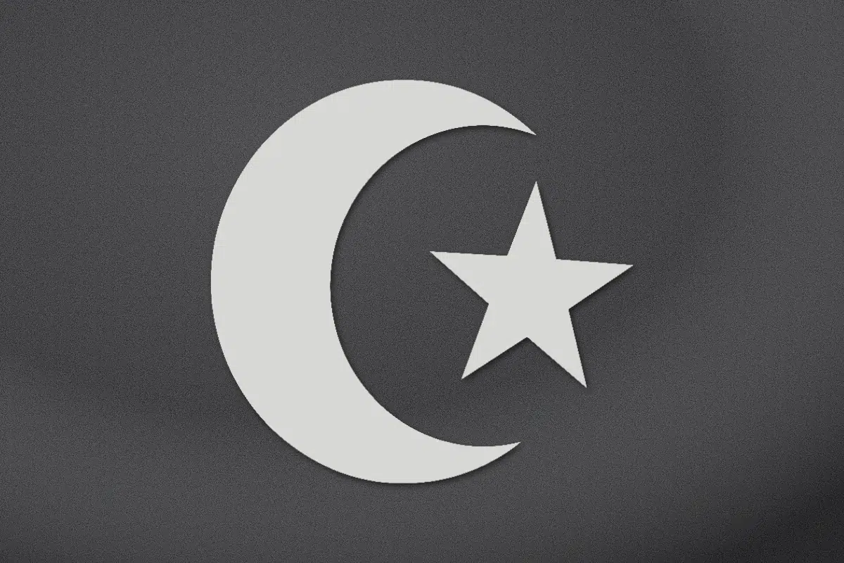 Crescent and star engraved on black granite