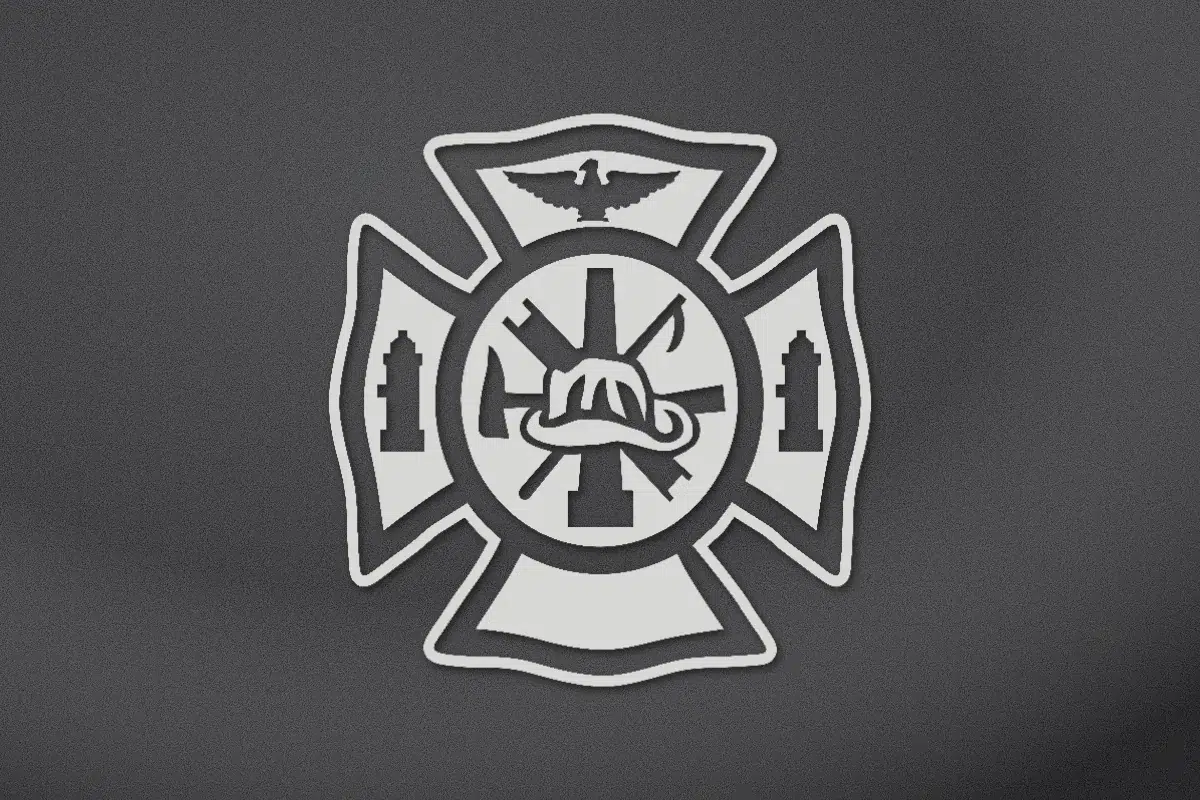 Firefighter Maltese cross with helmet, ladder and axe engraved on black granite