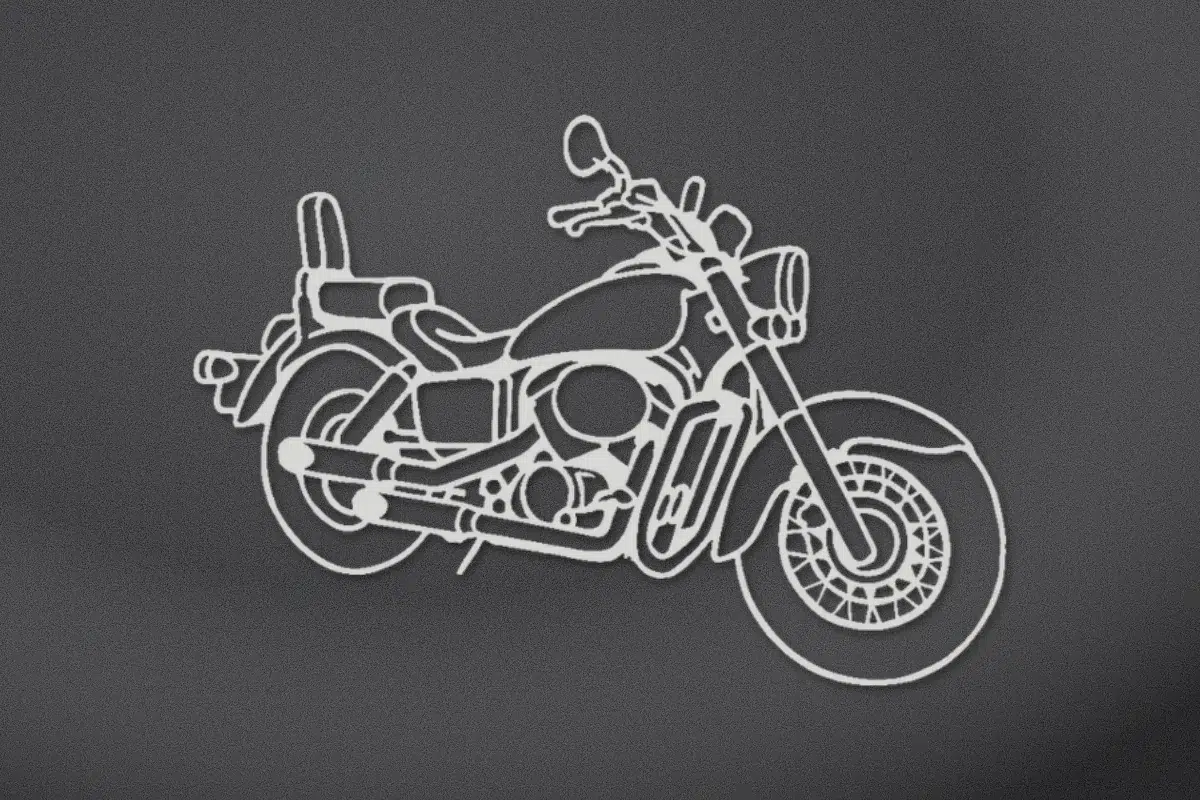 Motorcycle engraved on black granite