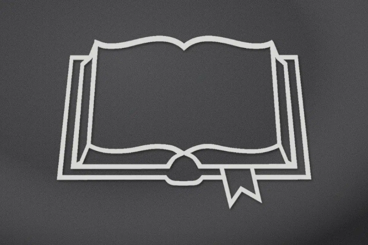 Open Bible engraved on black granite
